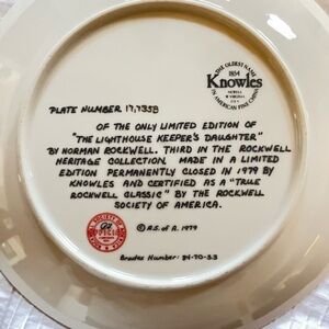 Two Norman Rockwell decorative plates.